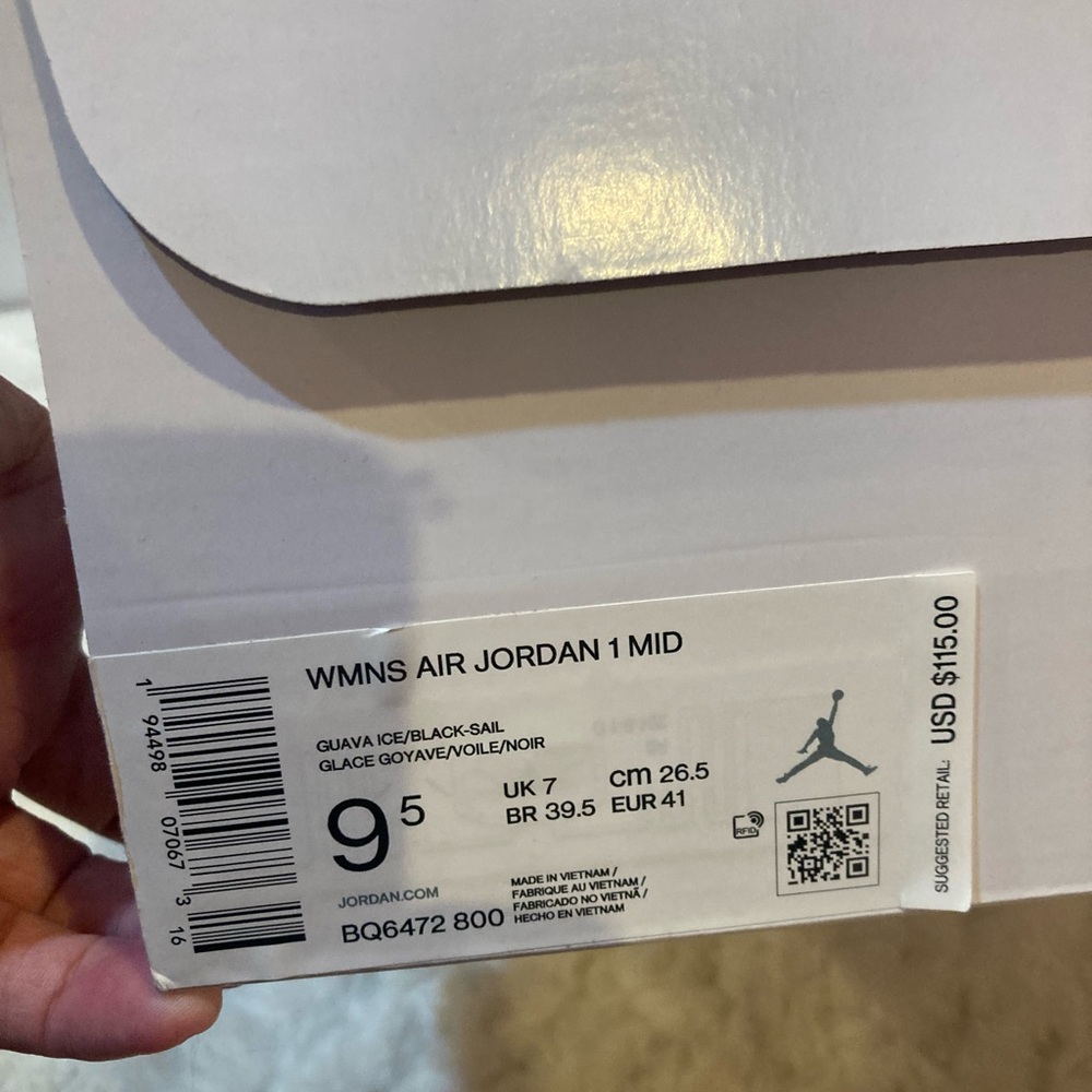 Nike Air Jordan 1 Mid in Guava Ice and Black